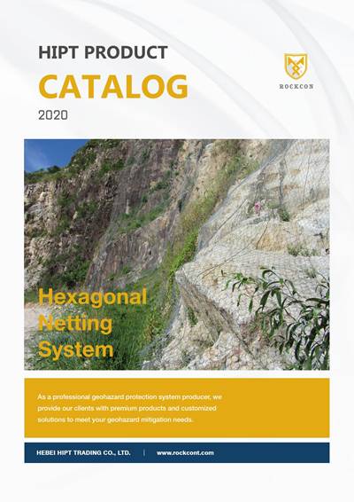 Hexagonal netting system drops from the steep slope.