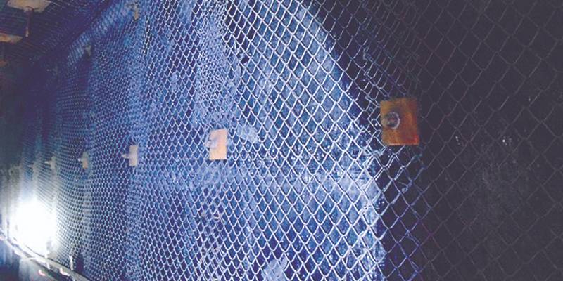 Mincon mesh is firmly fixed on the internal surface of the mine roadway with spike plates.