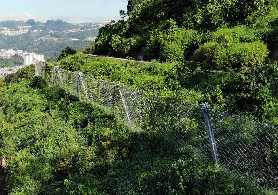 Reinforced rockcon avalanche barrier is established on the snow mountain.